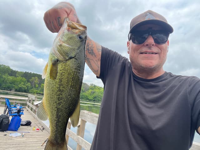 Mark Jackson holding a bass